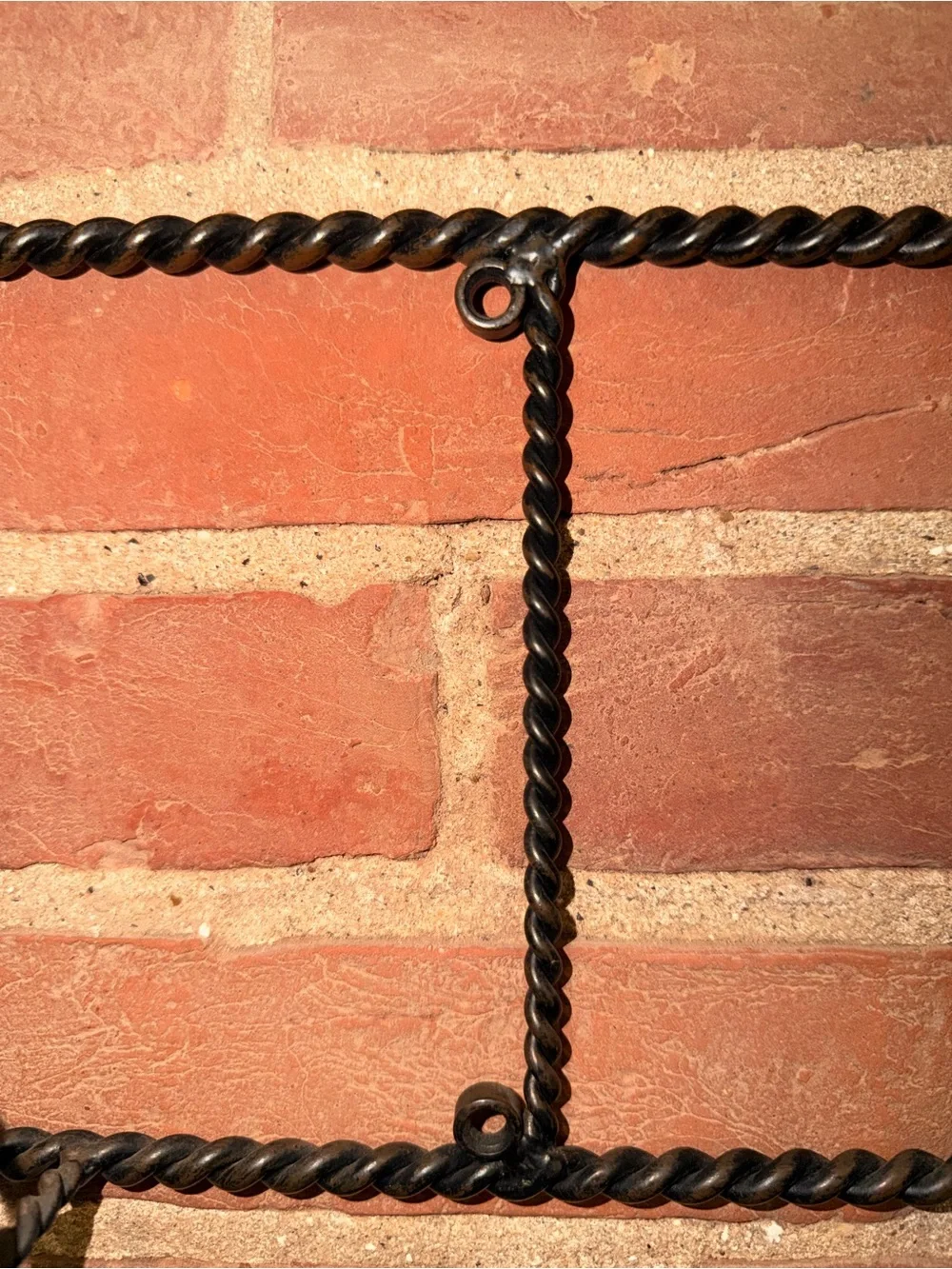 Ornate Black Metal Wall Hook Rack with Scroll Accents